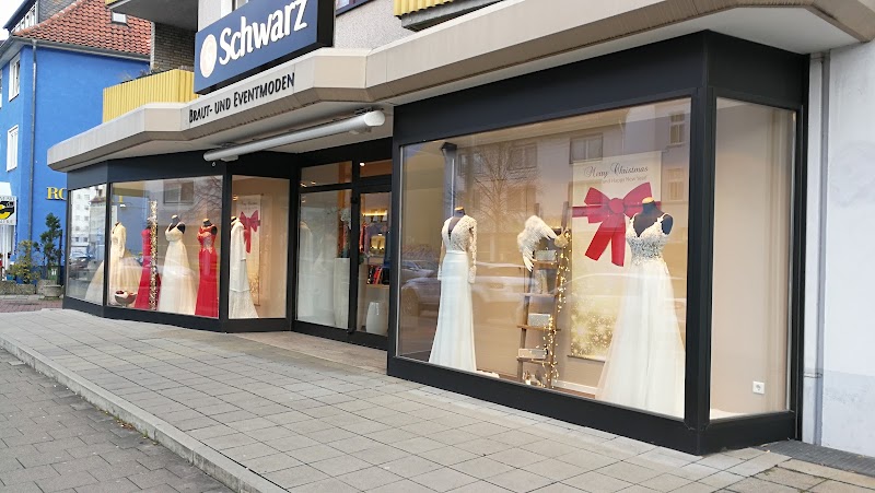 Schwarz Braut- und Eventmoden
